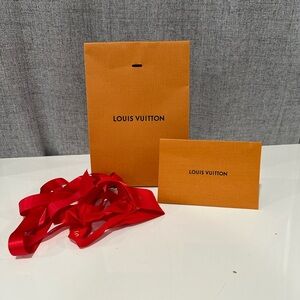 Authentic Louis  Vuitton perfume paper bag with receipt holder.
